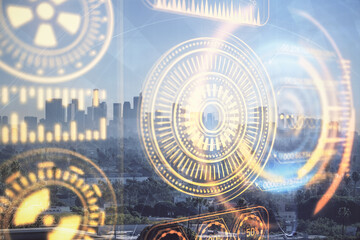 Double exposure of technology theme hologram and cityscape background. Concept of Hightech.