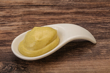 Dijon mustard sauce in the bowl