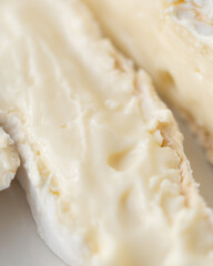 traditional cheese with white mold in the section