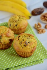 Banana date walnut muffins. Selective focus