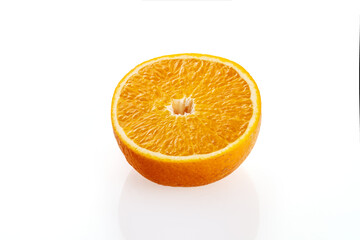 Half orange on a white background, isolate, close-up