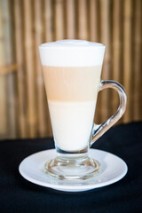 hot coffee latte in a glass 
