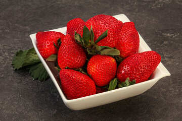 Ripe sweet strawberry with leaf