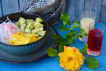 Es Teler, Indonesian fruit cocktail made from avocado, coconut meat and jackfruit. Served with coconut water, sweetened condensed milk and pandan syrup