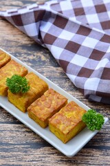 Fried tempeh. Made by a natural culturing and controlled fermentation process that binds soybeans...