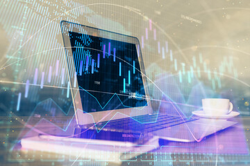 Forex market graph hologram and personal computer on background. Double exposure. Concept of investment.