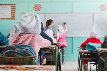 Girl attending class in a school in a Saharawi refugee camp