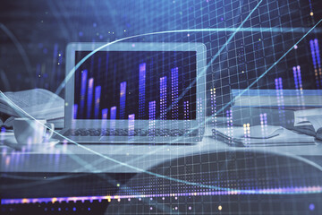 Fototapeta na wymiar Financial market graph hologram and personal computer on background. Double exposure. Concept of forex.