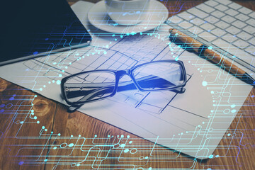 Data tech hologram with glasses on the table background. Concept of technology. Double exposure.