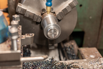 Detail on a lathe, metal cutting at a machine-building enterprise.