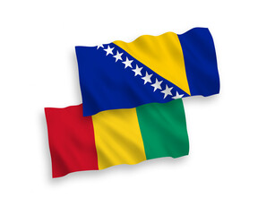 Flags of Bosnia and Herzegovina and Guinea on a white background