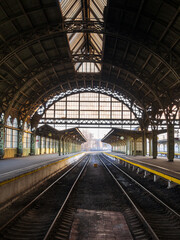 Fototapeta na wymiar St. Petersburg, Vitebsk railway station in an early sunny morning, platform with a clock