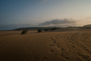 Dune landscape extending to the hills