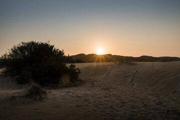 Dune landscape extending to the hills