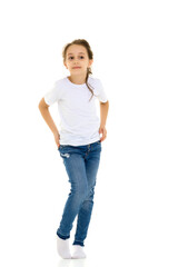 Fototapeta premium Pretty Stylish Girl with Ponytail Standing with Hands on Her Waist.