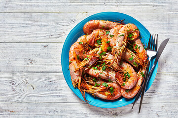 Garlic butter jumbo shrimps with lime and parsley