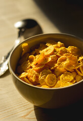 morning breakfast of cornflakes with milk and bananas