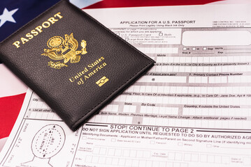 Application form to get a new American passport, patriotic flag background.