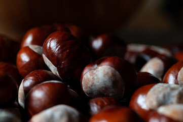 chestnuts on a wooden background