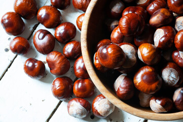 chestnuts on a wooden background