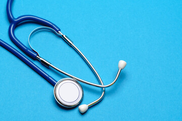 Top view of Medical stethoscope on blue background