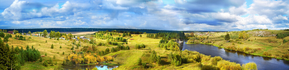 Picturesque horizontal sunny landscape with river, forest and meadows. Green natural background. A...