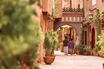 exotic building with beautiful arch window and fancy mosaic decoration in a desert town Xinjiang, China.
