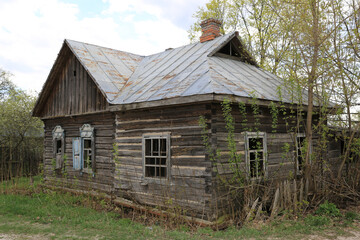 Fototapeta na wymiar Lost broken wooden old house