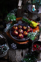 Cranberry Glazed Turkey Meatballs in a Christmas decor.