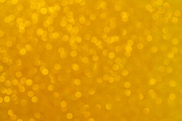 Abstract golden background. Beautiful bokeh effect. Light circles background.