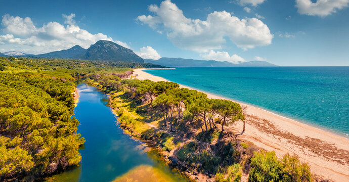 Amazing summer view from flying drone of Osala Beach. Beautiful morning scene of Sardinia island, Italy, Europe. Nice seascape of Mediterranean sea. Traveling concept background.
