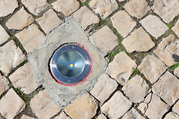 Round led lamp for night illumination of buildings and objects , with a metal rim and durable...