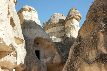 Unique limestone rock formations close up. Love valley at Goreme, Cappadocia, Turkey.