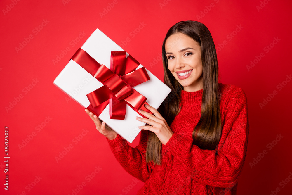 Sticker photo of positive girl hold big christmas gift box wear pullover jumper isolated over bright shine c