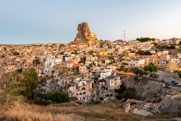 Fototapeta na wymiar Ortahisar Village view in Cappadocia during sunrise.