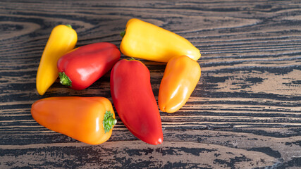 Closeup different colors of mini sweet paprika. Raw organic baby Sweet Peppers ready to eat....