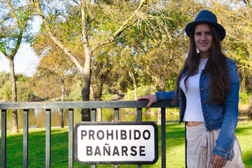 woman tourist with blue hat