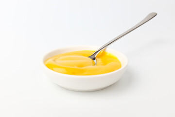 Mustard sauce on a white background