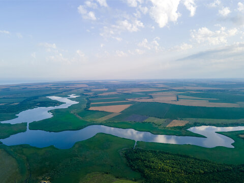 aerial view of the lake and agriculture fields
