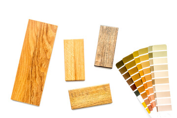 Wooden board floor and furniture samples with color scheme. Top view