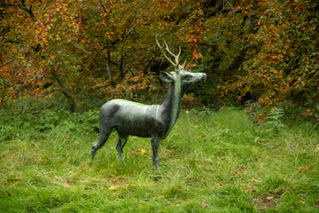 Statue of dear at Batsford arboretum, Morton-in-Marsh, Cotswolds UK