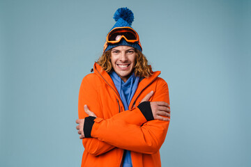 Caucasian pleased sportsman posing with palms together