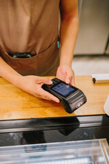 credit card payment. cashless technology and credit card payment concept. Man preparing the credit card terminal