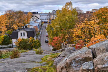 The old wooden district Puu Vallila of Helsinki, Finland. Autumn cityscape.