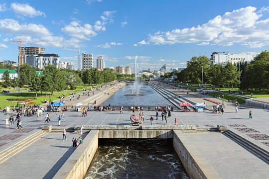 Yekaterinburg, Russia. View from the Dam of the city pond over the Historical Square with fountains. The Historical Square is located at the site of the former Iron Plant founded in 1723.