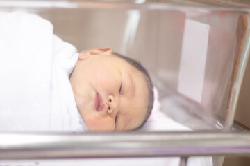 New Born Baby Girl Sleeping In Hospital Bed/Container