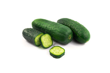 Sliced cucumbers on white isolated background, making up dishes, vegetable