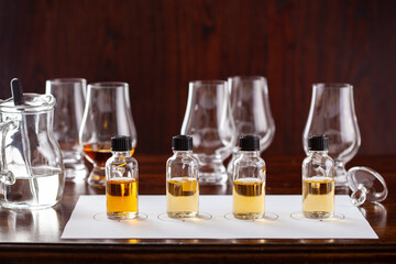 tasting bottles and glasses of whisky spirit brandy cognac. tasting at home