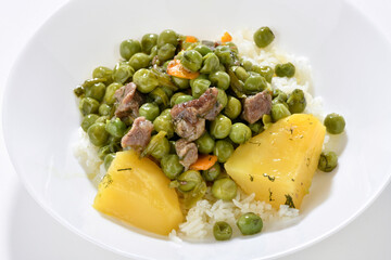 Green pea with minced meat over rice
