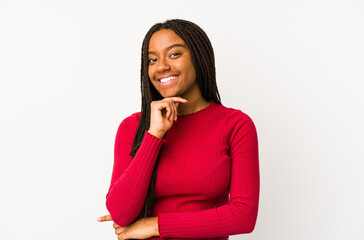 Young african american woman isolated smiling happy and confident, touching chin with hand.